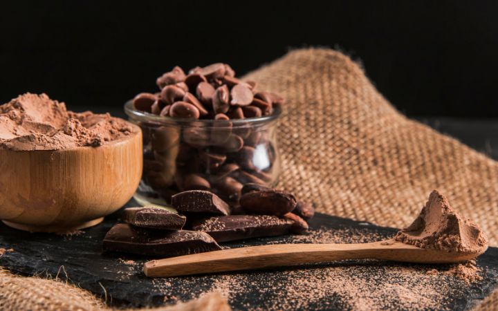 An artisanal scene of Ghirardelli chocolate making, highlighting the meticulous process and attention to detail.