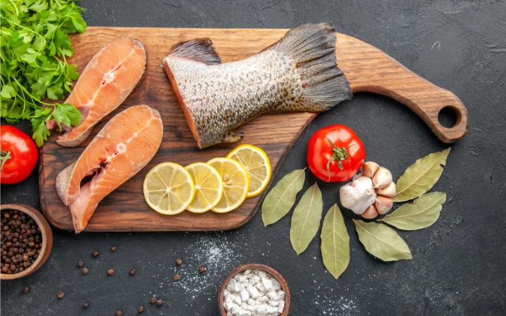 A joyful home cooking scene with a family gathered around a table enjoying a meal of chimichurri salmon.