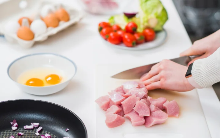 A sequential visual guide in a cozy kitchen, showing the step-by-step process of making Chicken Gnocchi Soup in a crockpot – from chopping vegetables and preparing chicken to the final simmering stage, capturing each important step.