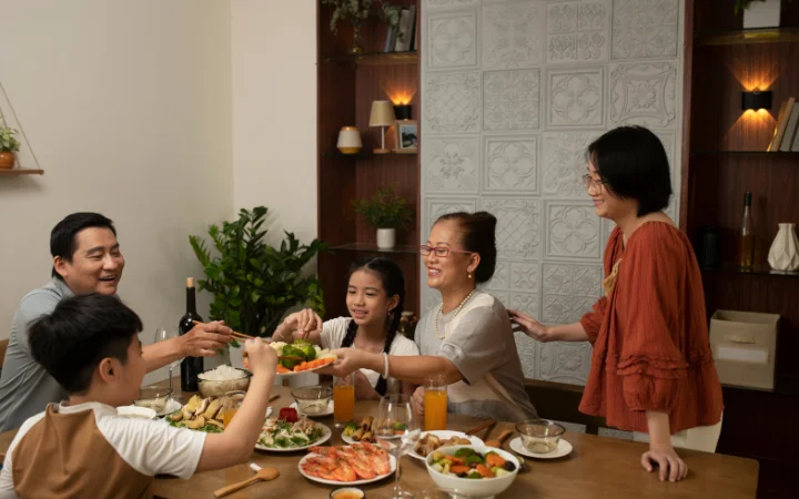 A heartwarming Filipino family dinner scene, with a table full of various corned beef dishes, symbolizing the cultural significance and communal joy of Filipino cuisine.