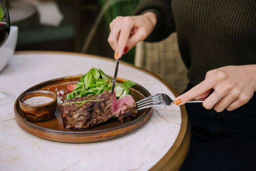 A creative display of vegan corned beef made from seitan, tofu, or jackfruit, showcasing the blend of spices and vibrant colors.