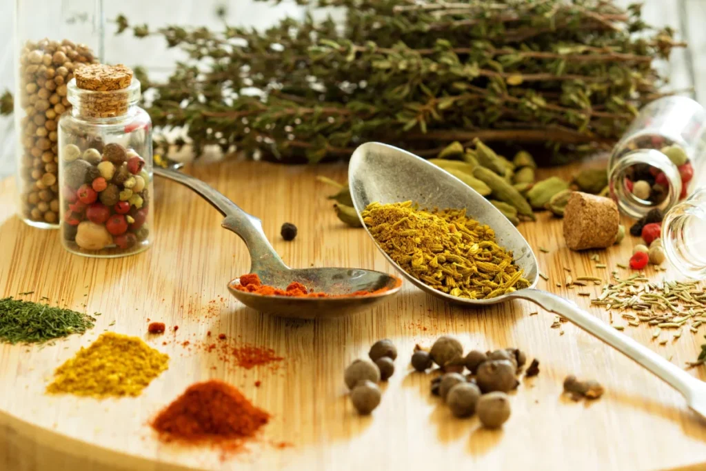 A vibrant and colorful display of  ingredients, including fresh herbs, olive oil, and spices.