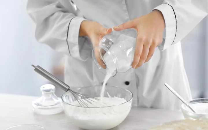 Cooking concept professional confectioner making delicious dessert closeup