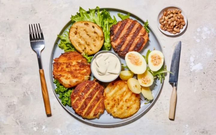 image that breaks down the nutritional content of hash brown patties, with icons representing vitamins, minerals, and calories. Incorporate visuals of potatoes, cauliflower patties, and gluten-free symbols, set against a backdrop of a balanced diet plate with sections for proteins, vegetables, and carbs, emphasizing health and dietary considerations.